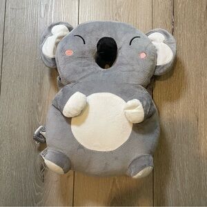 koala-style baby head protector pillow comforter playful backpack.